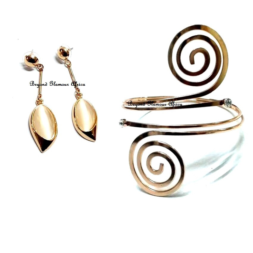 Womens Golden armlet with long dangle earrings
