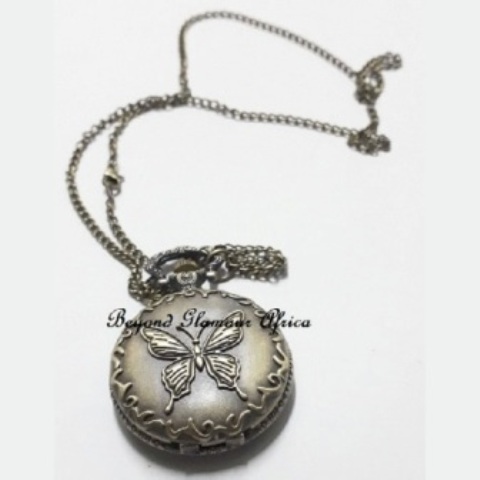Vintage butterfly brass pocket watch